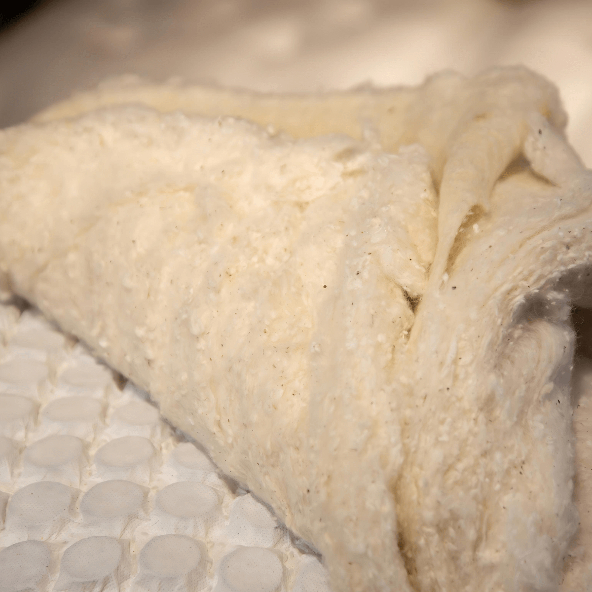 Close-up of natural filler used in the English Royal Mattress to ensure superior comfort and quality.