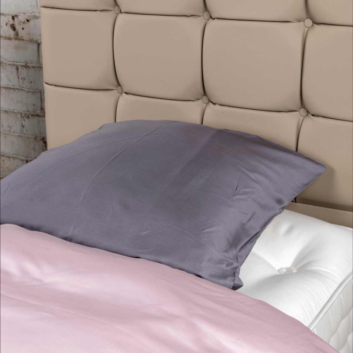 Luxurious British handmade mattress with top pillow, featuring natural fillers, high-quality craftsmanship, and modern technology.