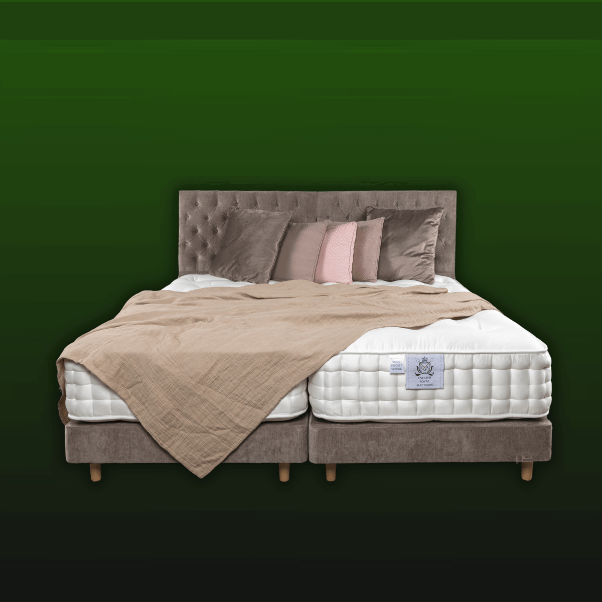 Luxury English Royal Mattress 12500 Pocket with natural fillers displayed on an elegant bed frame against a green background